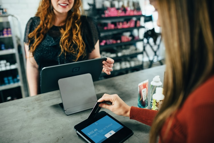 A woman buying a product with the salesperson’s recommendation as an implied warranty of fitness