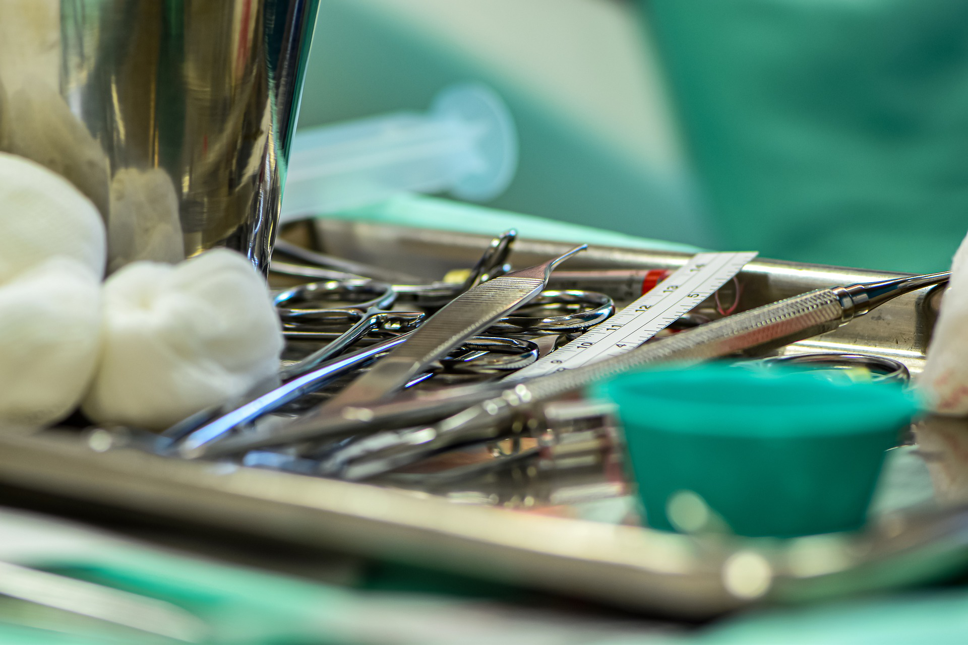 A surgical tray filled with various surgical equipment