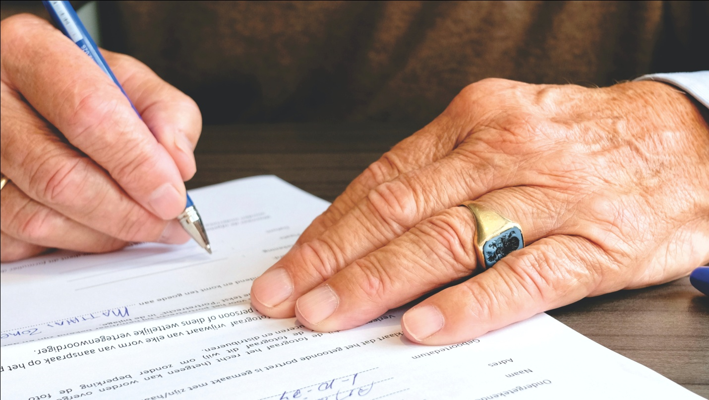 a person signing legal-application for social security benefits