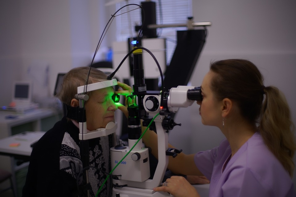 A person receiving an eye care consultation