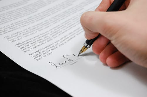  a person signing their document