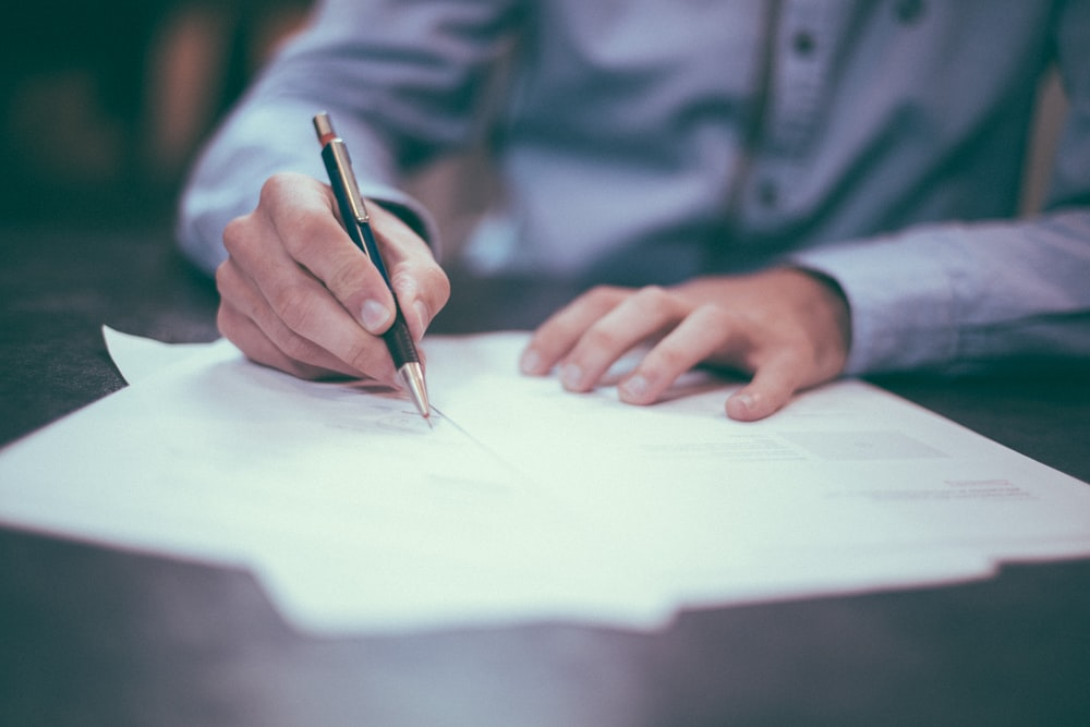 An SSD claimant signing their document